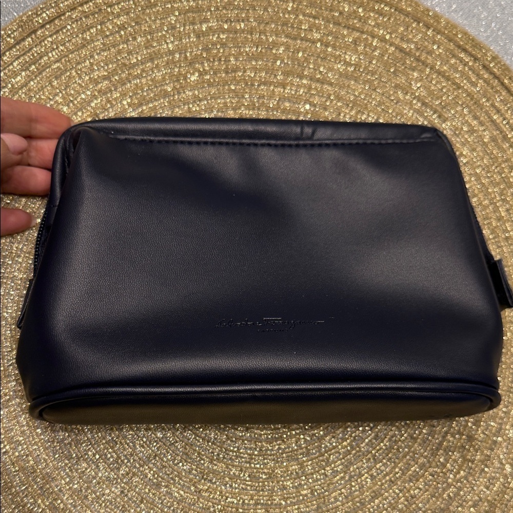 Salvatore Ferragamo small travel Bag size 5.5*8”
